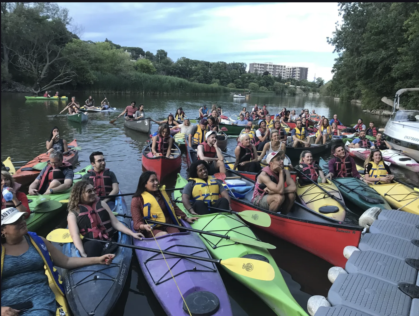 A real Shows on the River audience in colourful kayaks on Toronto’s Humber River