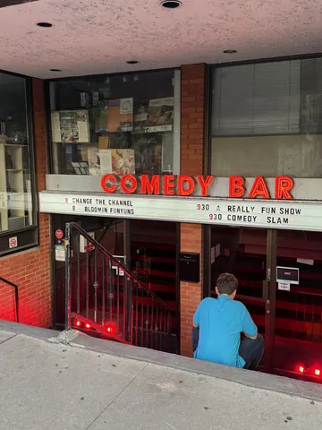 The Comedy Bar entrance on Bloor Street, with red lettering above the stairs